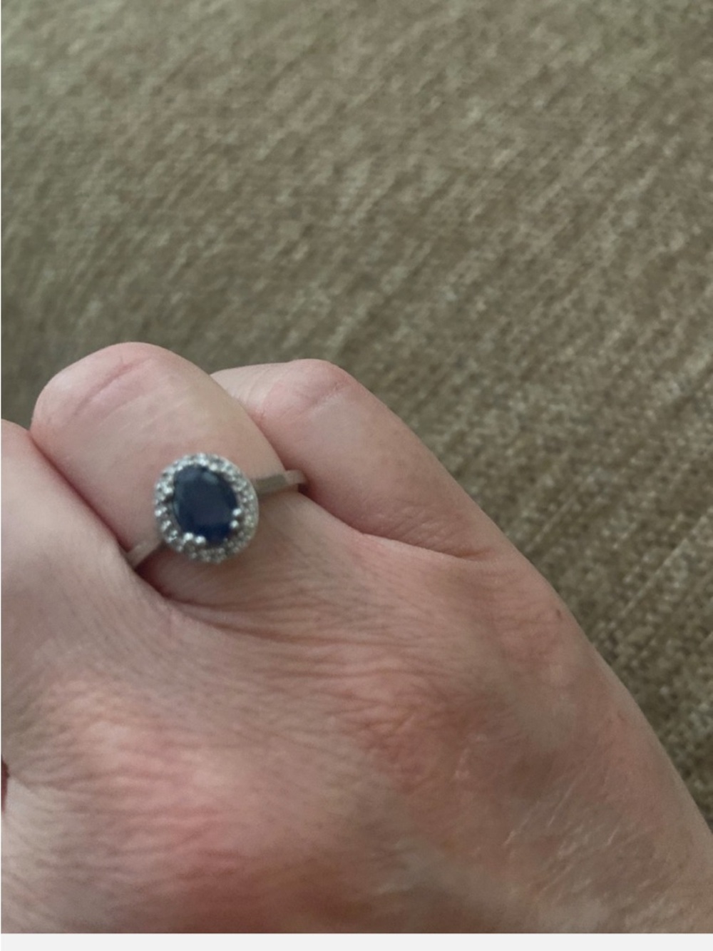 Elegant Sapphire Oval Halo Ring with Diamond Accent in Sterling Silver